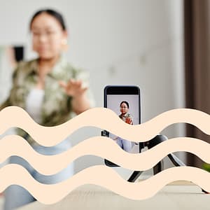 Charity campaigns: How to craft compelling campaigns. Photo of a person filming themselves on their mobile phone.